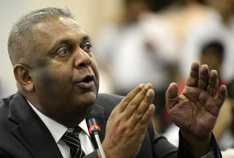 Mangala Samaraweera (R) -- a loyalist MP for Ranil Wickremesinghe -- speaks at a meeting with speaker Karu Jayasuriya at the Parliament Building in Colombo on November 2, 2018. Sri Lanka's speaker on November 2 summoned the country's parliament to meet next week in defiance of the president as a constitutional crisis darkened with an MP telling how he was offered millions of dollars and a minister's post to defect to a rival camp.
 / AFP / LAKRUWAN WANNIARACHCHI
