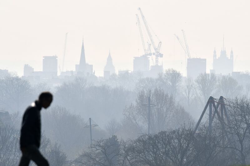 The Mayor of London has issued an alert covering three days, urging people to avoid unnecessary car journeys to reduce air pollution. AFP