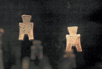 ABU DHABI , UNITED ARAB EMIRATES, September 16 – 2018 :- Coins in the form of spades , China , 400-300 BCE on display at the Louvre museum in Abu Dhabi. ( Pawan Singh / The National )  For Arts and Culture. Story by Rupert Hawksley 