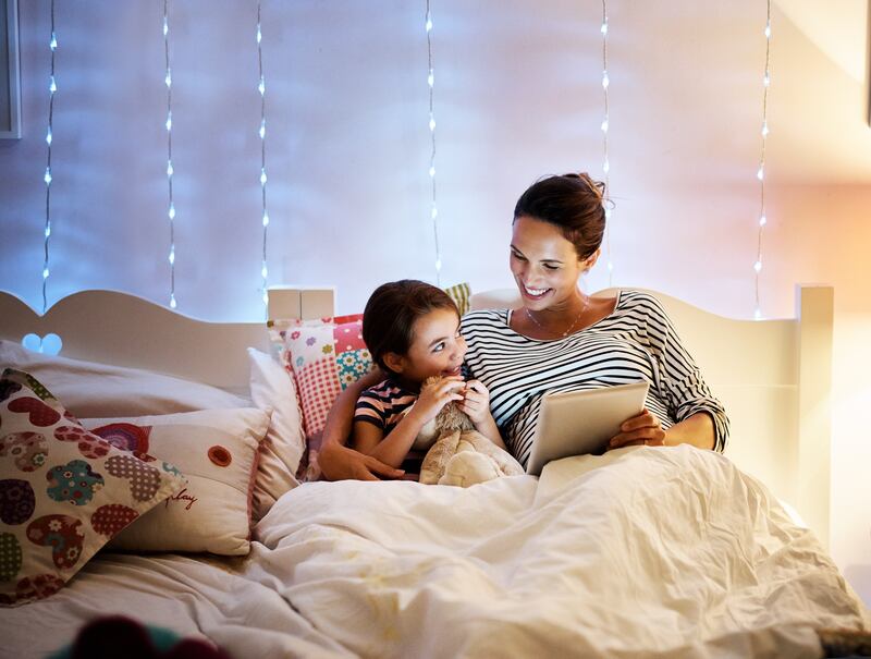 Reading to children as part of their bedtime ritual may encourage them to continue the activity when they are older. Getty Images