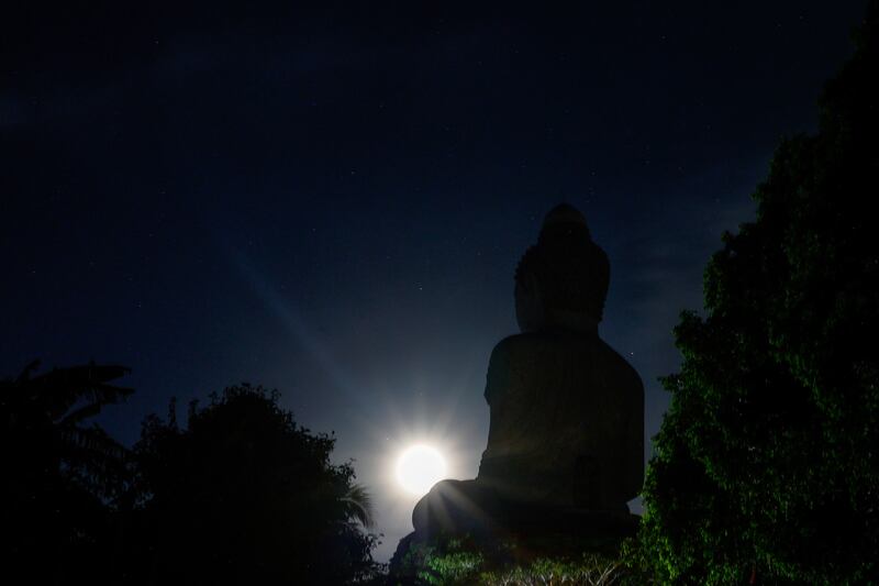 A supermoon in front of the Big Buddha statue in Phuket, Thailand. Reuters