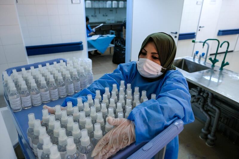 A nurse prepares bottles of sterilising fluid at the Benghazi Medical Centre in Benghazi, Libya. Reuters