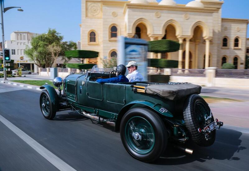 Bentley’s 4 1/2 Litre supercharged Blower, driven by brand ambassador Richard Charlesworth, on the streets of Dubai. Victor Besa for The National