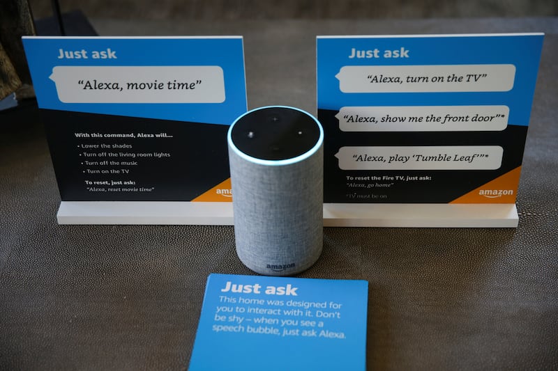 Prompts on how to use Amazon's Alexa personal assistant are seen alongside an Amazon Echo in an Amazon ‘experience center’  in Vallejo, California, U.S., May 8, 2018. Picture taken on May 8, 2018. REUTERS/Elijah Nouvelage