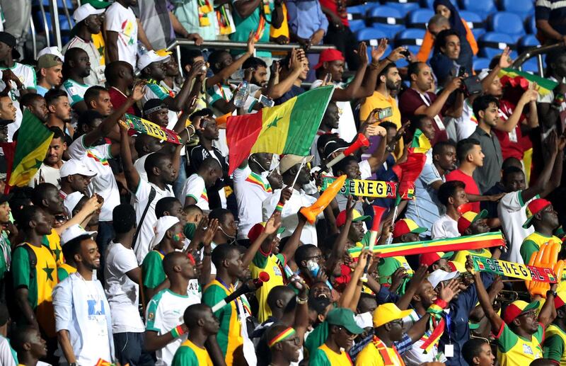 Senegal fans cheer son their team at the 30 June Stadium in Cairo. Reuters