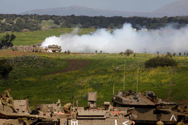 A picture shows an Israel military drill near Kibbutz Merom Golan in the Israeli-annexed Golan Heights on March 17, 2021. / AFP / JALAA MAREY
