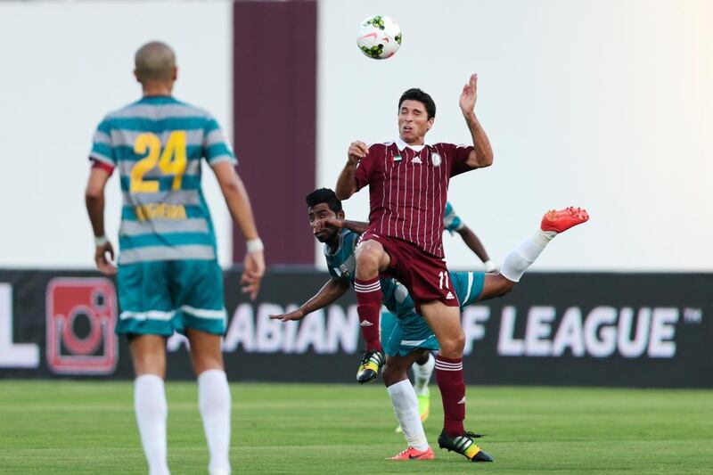 Al Wahda's Sebastian Tagliabue, right, scored twice to lift the Abu Dhabi side up to third in the Arabian Gulf League table with a 2-0 victory over Al Nasr on Saturday. Christopher Pike / The National