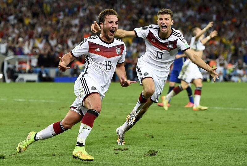 Gotze celebrates with Muller, surely the high point of his career. Dylan Martinez / Reuters