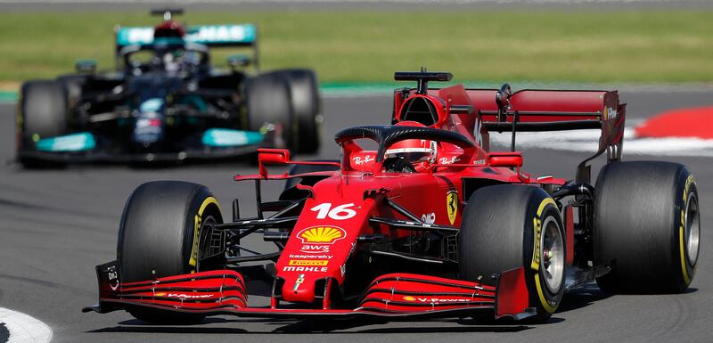 Ferrari driver Charles Leclerc ahead of Mercedes' Lewis Hamilton.