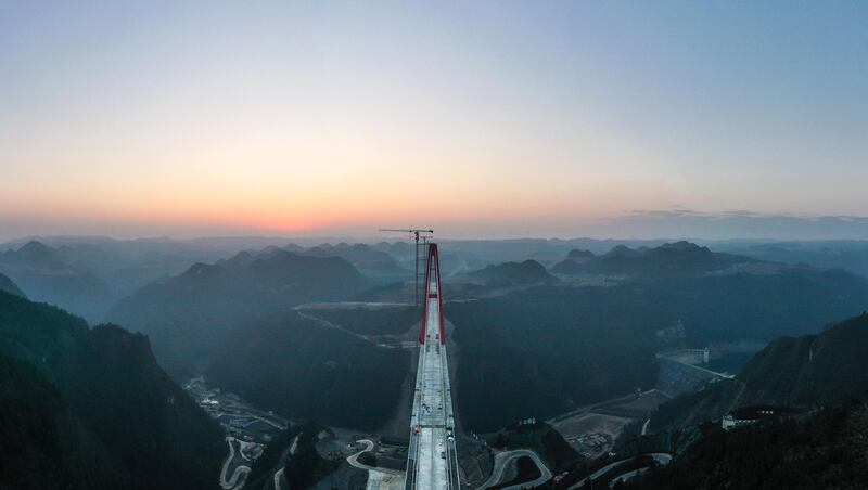 Aerial panorama view of the Longlihe Bridge in Longli County, southwest China's Guizhou Province, 29 January 2023.  The 1,260-meter-long bridge is under construction.   EPA / XINHUA  /  Yang Wenbin CHINA OUT  /  MANDATORY CREDIT  EDITORIAL USE ONLY