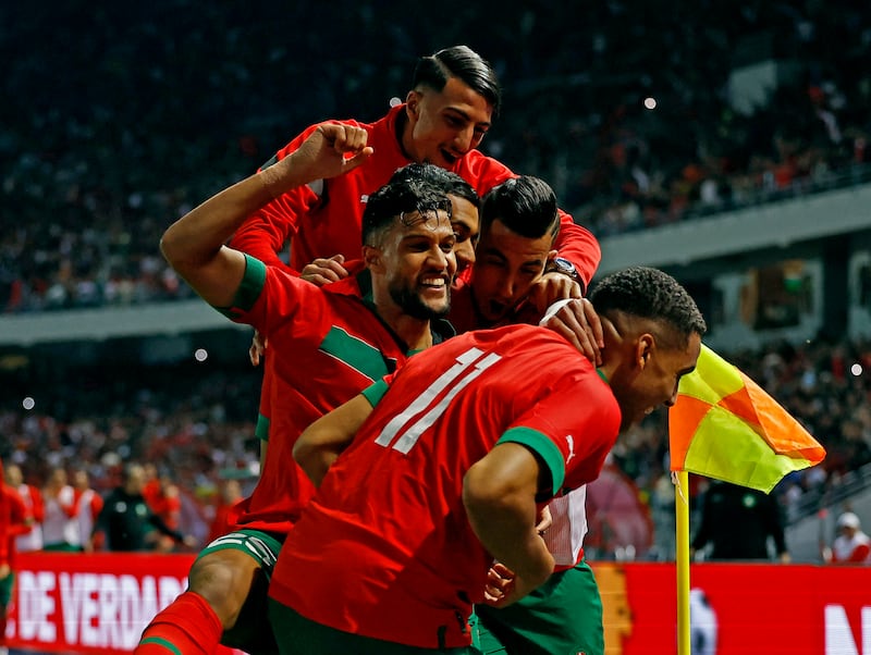 Morocco's Abdelhamid Sabiri celebrates scoring their second goal with teammates. Reuters