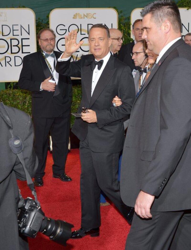 Tom Hanks arrives at the 71st annual Golden Globe Awards at the Beverly Hilton Hotel on Sunday, Jan. 12, 2014, in Beverly Hills, Calif. John Shearer/Invision/AP)