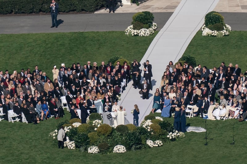 While it was not the first White House wedding, it was the first to take place on the South Lawn. AP