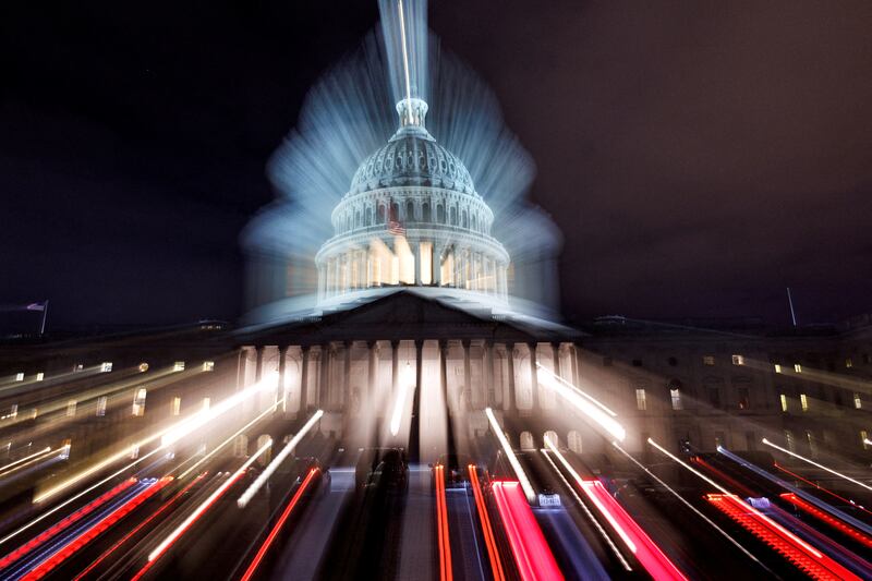 A long-exposure image shows the US Capitol building before President Joe Biden addresses a joint session of Congress, during the State of the Union address, in Washington. Reuters