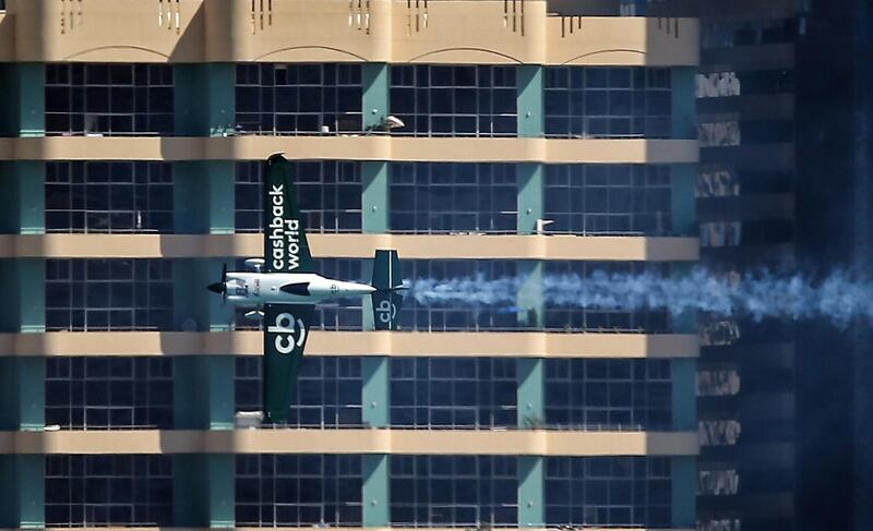 Pete Mcleod of Canada flies by a building. AFP