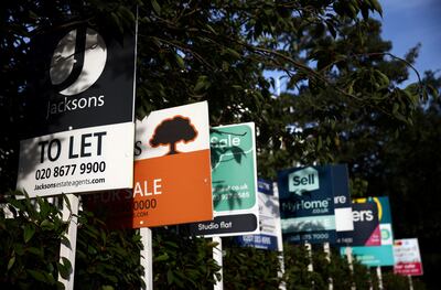 Property estate agent sales and letting signs in south London. Reuters 