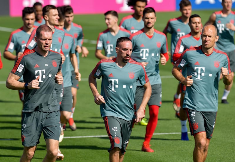 epa07263311 Bayern Munich's Franck Ribery (C) and Arjen Robben (R) take part in the winter training camp at the Aspire Academy in Doha, Qatar, 05 January 2019. Bayern Munich holds the training camp until 10 January 2019.  EPA/Noushad Thekkayil