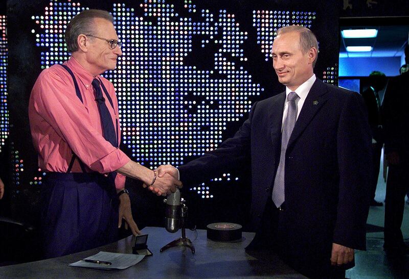 Russian President Vladimir Putin shakes hands with Larry King before a taping of The Larry King Show in New York on September 8, 2000. Reuters