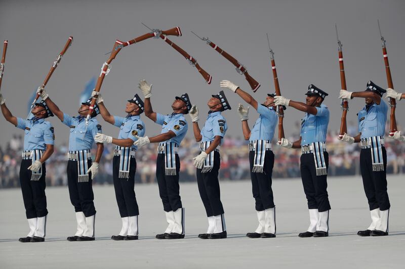 Indian Air Force (IAF) air warrior drill team members display skills on Air Force Day in Hindon, India. Tsering Topgyal / AP Photo