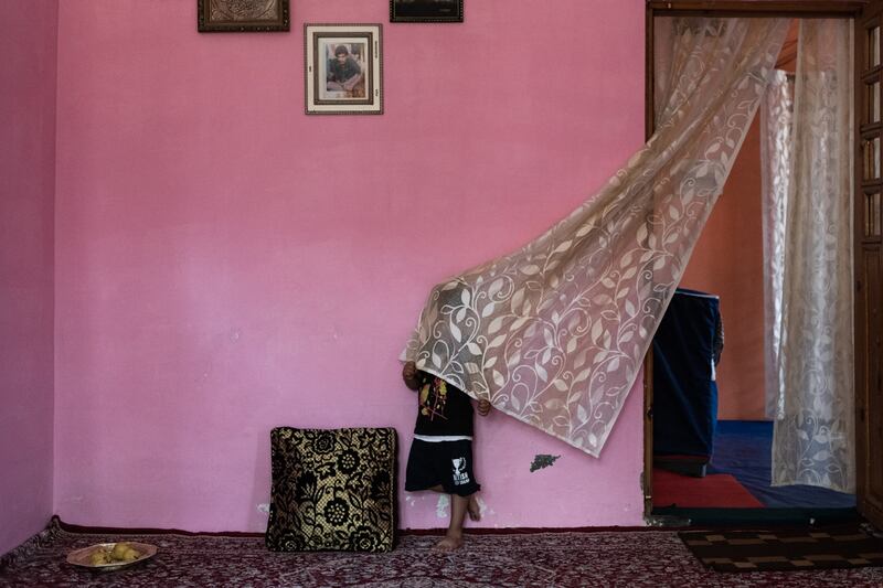 Rebecca Conway's image of the grandson of Parveena Ahanger, founder of the Association of Parents of Disappeared Persons in Jammu and Kashmir, India, which won the 2022 Camille Lepage Award. Photo: Rebecca Conway