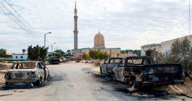 TOPSHOT - A picture taken on November 25, 2017, shows the Rawda mosque, roughly 40 kilometres west of the North Sinai capital of El-Arish, after a gun and bombing attack.
Armed attackers killed at least 235 worshippers in a bomb and gun assault on the packed mosque in Egypt's restive North Sinai province, in the country's deadliest attack in recent memory.   / AFP PHOTO / STR