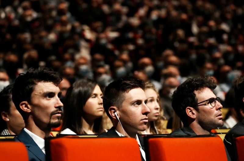 Julian Alaphilippe, Tadej Pogacar, and Mark Cavendish attend at the presentation of the 2022 Tour de France. AP