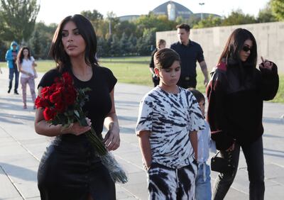 Reality TV personality Kim Kardashian and her sister Kourtney Kardashian with children visit Armenian Genocide Memorial in Yerevan, Armenia October 8, 2019. Hayk Baghdasaryan/Photolure via REUTERS  ATTENTION EDITORS - THIS IMAGE WAS PROVIDED BY A THIRD PARTY.
