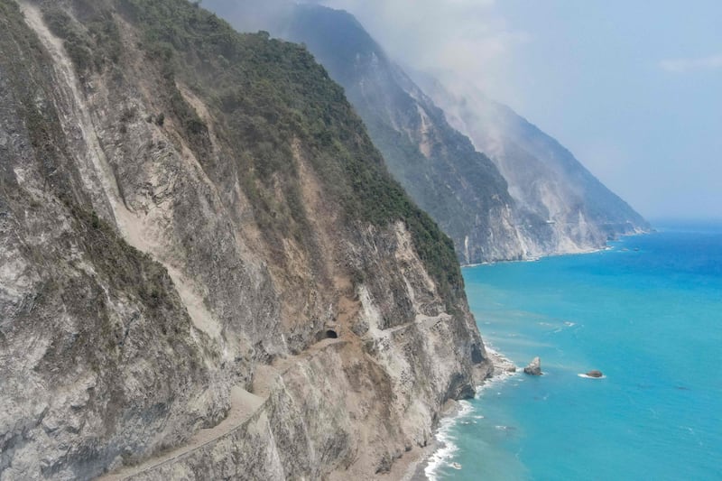 Ash covers Ching-shui Cliff’s tunnel after an earthquake hit in Hualien. AFP