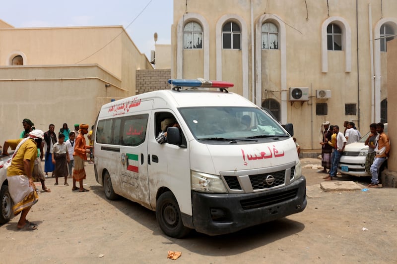 An ambulance transports casualties of strikes on Al Anad airbase to the Ibn Khaldun hospital in the government-held southern province of Lahij. AFP