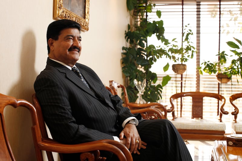 ABU DHABI, UNITED ARAB EMIRATES - December 31, 2009: Dr B. R. Shetty, Managing Director and CEO of NMC Group (NMC Specialty Hospital, UAE Exchange, Neopharma) sits for a portrait in his office. 
( Ryan Carter / The National ) *** Local Caption ***  RC007-DrShetty20091231.jpg