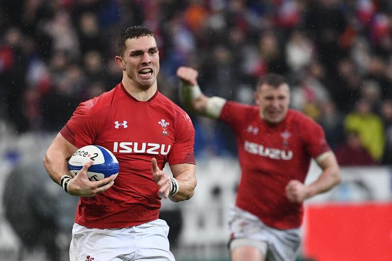 Wales' winger George North runs to score a try during the Six Nations rugby union tournament match between France and Wales at the stade de France, in Saint Denis, on the outskirts of Paris, on February 1, 2019. / AFP / Anne-Christine POUJOULAT            

