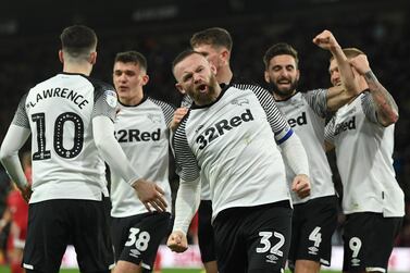 DERBY, ENGLAND - FEBRUARY 21: Wayne Rooney of Derby celebrates scoring the opening goal from a penalty during the Sky Bet Championship match between Derby County and Fulham at Pride Park Stadium on February 21, 2020 in Derby, England. (Photo by Ross Kinnaird/Getty Images)