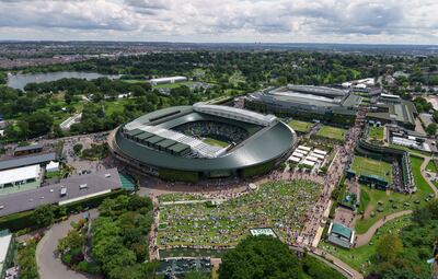 LONDON, ENGLAND - JULY 05: Aerial view across the grounds as spectators watch the big screen on the outside of No.1 Court during Day Seven of The Championships - Wimbledon 2021 at All England Lawn Tennis and Croquet Club on July 05, 2021 in London, England. (Photo by AELTC/Joe Toth - Pool/Getty Images)