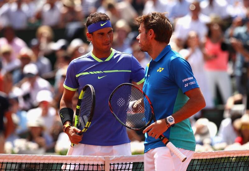 Rafael Nadal and Stan Wawrinka greet each other prior to the match. Getty Images