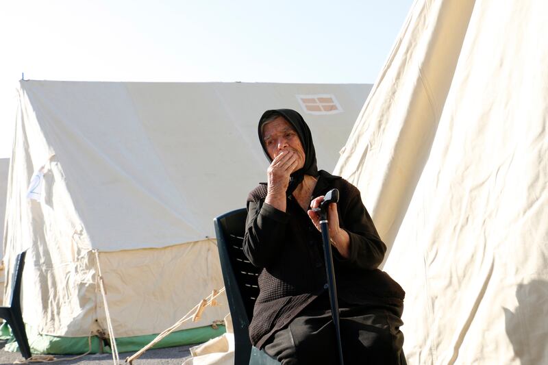 An elderly woman sits outside a tent in Archalochori village, near Heraklio city, in the aftermath of an earthquake registering 5. 8 on the Richter scale, Greece, 28 September 2021.  Authorities set up tents for residents of Arkalohori in the southern part of Crete, after an earthquake registering 5. 8 on the Richter scale shook the island on September 27th.  One person died while repairing a church rook and nine people were injured, one seriously.  Arkalohori homes sustained heavy damage and are unsafe.  Armed Forces, volunteers and members of the Hellenic Red Cross set up a temporary tent camp for Monday night.  Tents were also set up at villages along the municipality of Minoas Pediadas, where homes have been damaged.   EPA / NIKOS CHALKIADAKIS