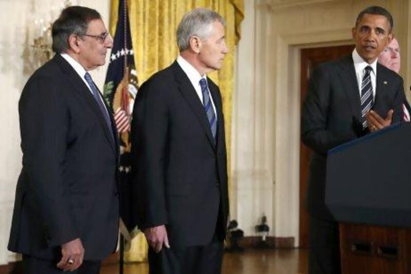 President Barack Obama announces his nomination of former US senator Chuck Hagel (centre) as his new secretary of defence, with current defence chief Leon Panetta (left).