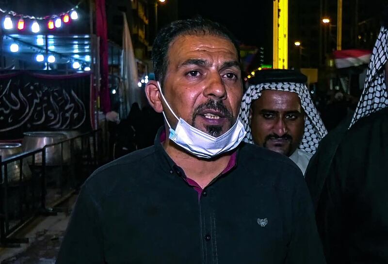 A grab from an AFPTV video taken on August 27, 2020, shows Iraqi activist Ehab al-Ouazni during a mourning ritual to commemorate the martyrdom of Prophet Mohammad's grandson Imam Hussein during the Islamic month of Muharram, in the central shrine city of Karbala. The renowned anti-government activist was killed in Iraq early today, security sources and activists said, sending supporters of a protest movement onto the streets to demand an end to bloodshed. / AFP / -
