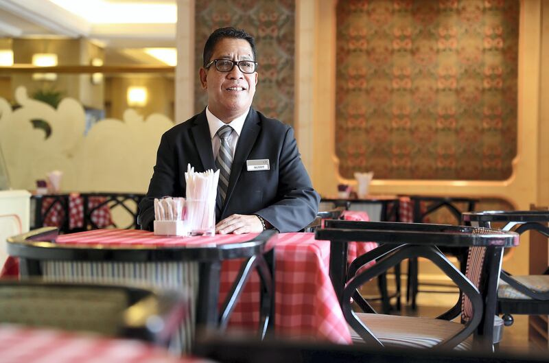 ABU DHABI , UNITED ARAB EMIRATES , SEP 14 ��� 2017 : Buddy , Supervisor of Beaujolais restaurant in the Mercure hotel in Abu Dhabi. He is working here for the last 25 years. ( Pawan Singh / The National ) Story by John Dennehy