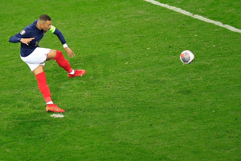 France's Kylian Mbappe scores from the penalty spot. AFP