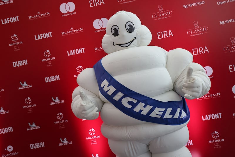 Bibendum, also know as the Michelin Man, is pictured during a ceremony revealing the 2022 selection of the Michelin Guide Dubai on June 21, 2022. AFP