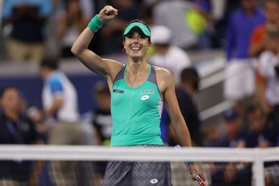 Alize Cornet celebrates her win over Emma Raducanu. Getty
