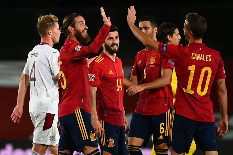 Spain players celebrate at the end of the UEFA Nations League match against Switzerland. AFP