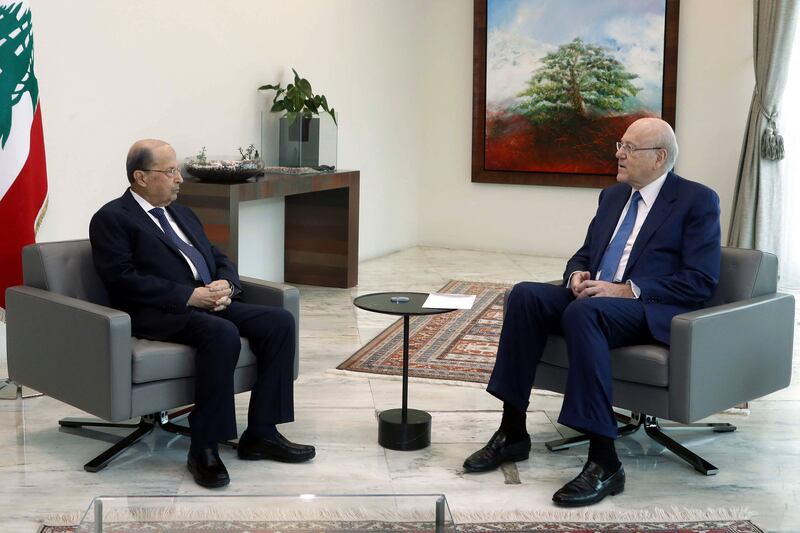 Mr Aoun (L) and Mr Mikati before the announcement of the formation of a new Lebanese government ending a 13-month vacancy. Dalati and Nohra / AFP