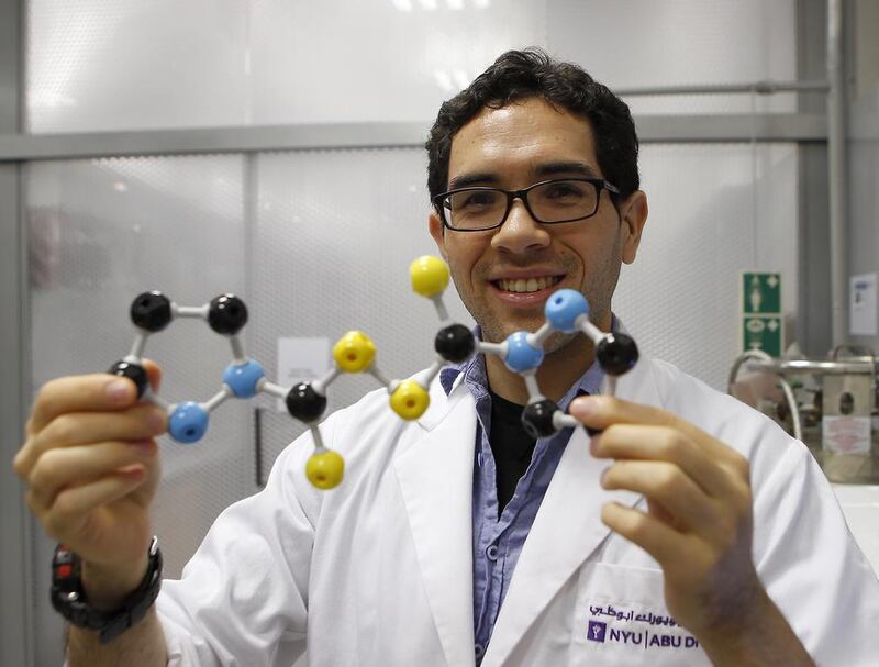 Dr Patrick Commins with a model of a self-healing crystal at New York University Abu Dhabi. ‘The work has a lot of potential towards creating new materials. Everyone can imagine how incredible it would be to have common items self-heal,’ he says. Ravindranath K / The National