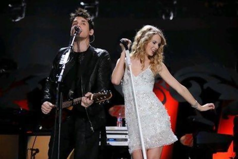 John Mayer and Taylor Swift. Bryan Bedder / Getty Images / AFP