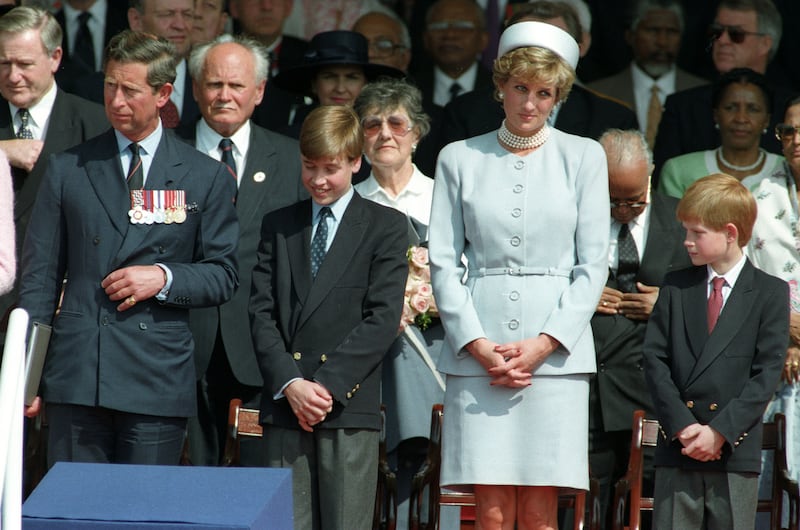 The Prince of Wales, Prince William, Princess Diana and Prince Harry attend the Heads of State ceremony in Hyde Park to commemorate the 50th Anniversary of VE Day in London on May 7, 1995