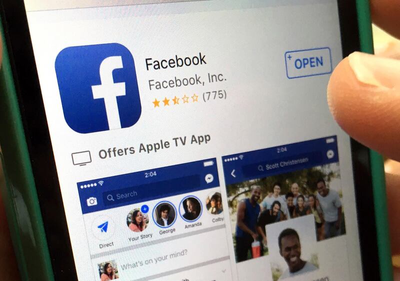 FILE - In this Monday, June 19, 2017, file photo, a user gets ready to launch Facebook on an iPhone, in North Andover, Mass. Facebook��������s efforts to reduce the spread of fake news using outside fact-checkers may be working, but with a big caveat. The company says once a story receives a �������false rating������� from a fact-checker, Facebook is able to reduce future impressions of it by 80 percent. But it regularly takes more than three days for a story to receive a false rating. And, the way news stories work, most impressions happen when the story first comes out, not three days later. (AP Photo/Elise Amendola, File)