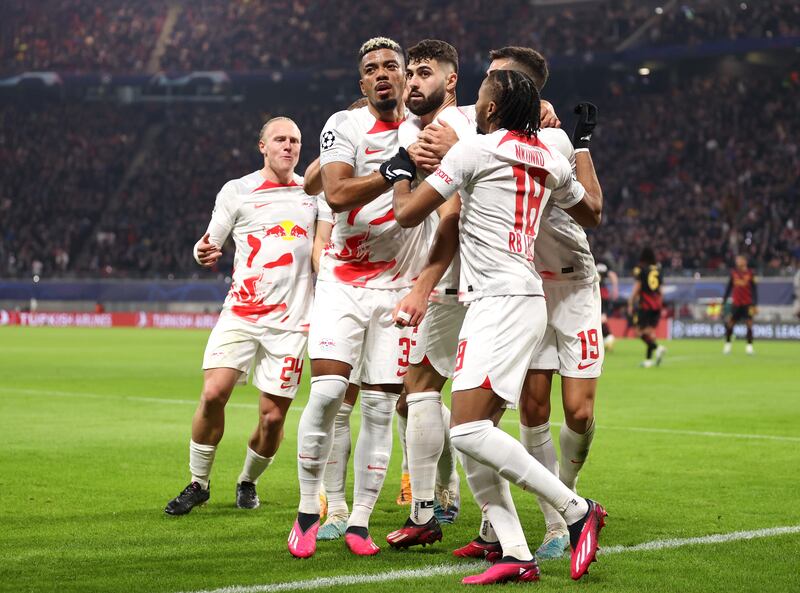 Gvardiol celebrates with teammates. Getty