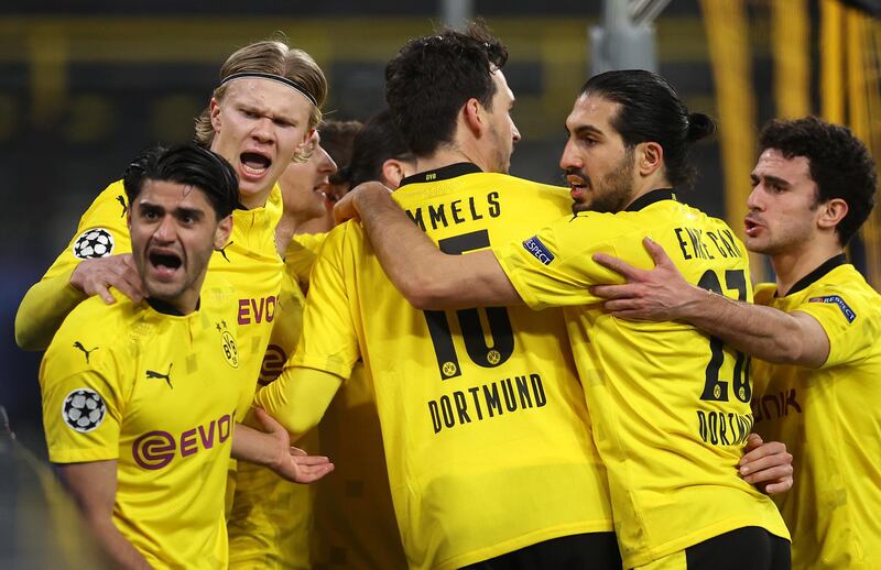 Erling Haaland of Borussia Dortmund celebrates with Mahmoud Dahoud, Mats Hummels, Emre Can and Mateu Morey after scoring their side's first goal against Sevilla. EPA