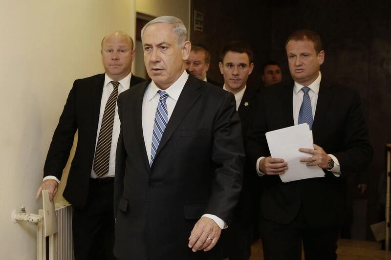 The Israeli prime minister Benjamin Netanyahu arrives for the weekly cabinet meeting in Jerusalem on Sunday. Gali Tibbon / AFP 